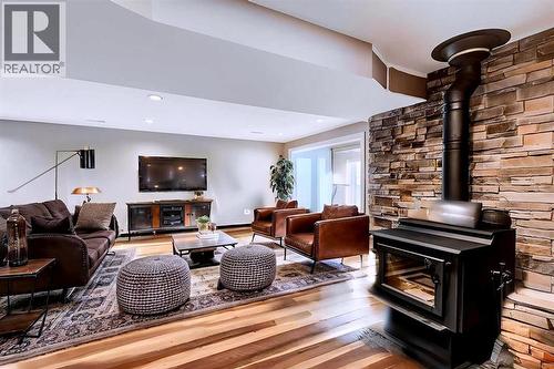 Disclaimer! This Photo is virtually staged. Main Floor - 284226 Township Road 254, Rural Rocky View County, AB - Indoor Photo Showing Living Room