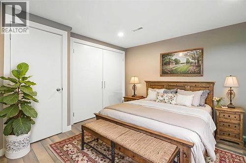 Disclaimer! This Photo is virtually staged - 284226 Township Road 254, Rural Rocky View County, AB - Indoor Photo Showing Bedroom