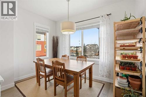 Dining room - 70, 111 Rainbow Falls Gate, Chestermere, AB - Indoor Photo Showing Dining Room