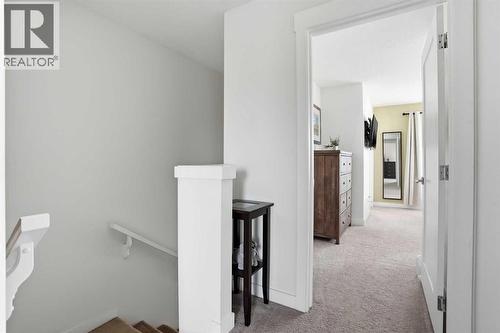 Upstairs landing - 70, 111 Rainbow Falls Gate, Chestermere, AB - Indoor Photo Showing Other Room
