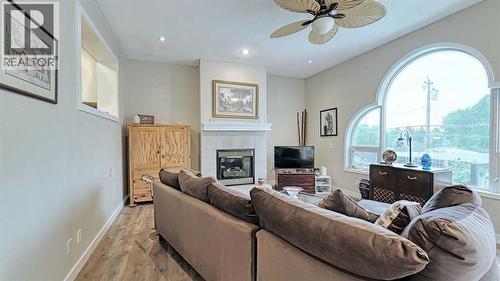 7508 7 Street Nw, Calgary, AB - Indoor Photo Showing Living Room With Fireplace