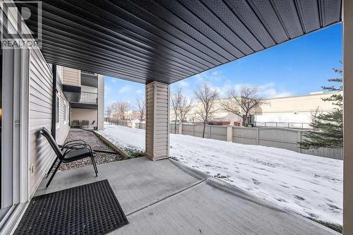 Patio Looking NW - 1120, 4975 130 Avenue Se, Calgary, AB - Outdoor With Exterior