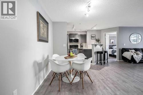1120, 4975 130 Avenue Se, Calgary, AB - Indoor Photo Showing Dining Room
