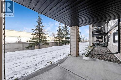 Patio Looking NE - 1120, 4975 130 Avenue Se, Calgary, AB - Outdoor With Exterior