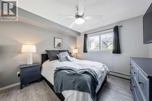 Primary Bedroom - 1120, 4975 130 Avenue Se, Calgary, AB - Indoor Photo Showing Bedroom