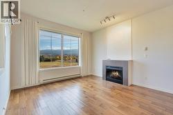 Spacious Living Room with Electric Fireplace - 