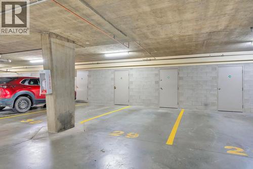 Secured Underground Parking (Stall #29) - 3739 Casorso Road Unit# 313, Kelowna, BC - Indoor Photo Showing Garage