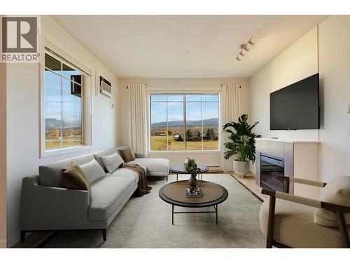 Virtually Staged - 3739 Casorso Road Unit# 313, Kelowna, BC - Indoor Photo Showing Living Room With Fireplace