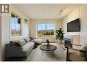Virtually Staged - 3739 Casorso Road Unit# 313, Kelowna, BC  - Indoor Photo Showing Living Room With Fireplace 