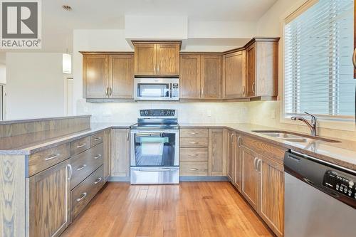 3739 Casorso Road Unit# 313, Kelowna, BC - Indoor Photo Showing Kitchen With Double Sink