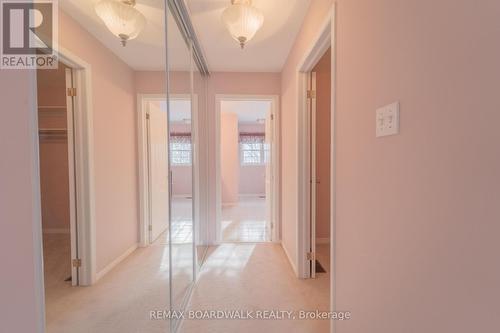 Primary Bedroom - His & Hers Closets - 57 Mattawa Crescent, Ottawa, ON - Indoor Photo Showing Other Room