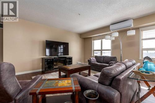 328, 4102 69 Avenue, Lloydminster, AB - Indoor Photo Showing Living Room