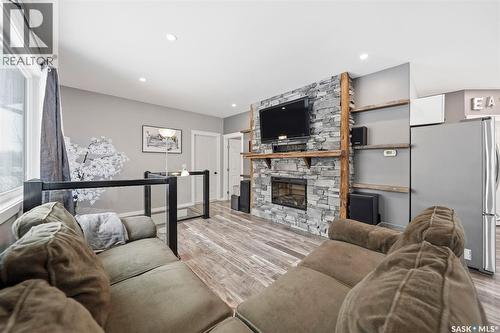 1110 Main Street N, Watrous, SK - Indoor Photo Showing Living Room With Fireplace