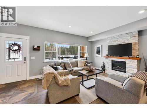 1512 Granite Drive Unit# 4, Golden, BC - Indoor Photo Showing Living Room With Fireplace