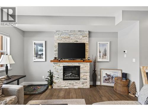 1512 Granite Drive Unit# 4, Golden, BC - Indoor Photo Showing Living Room With Fireplace