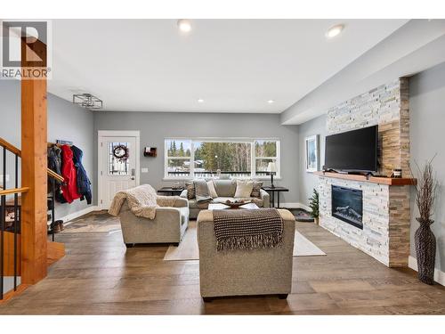 1512 Granite Drive Unit# 4, Golden, BC - Indoor Photo Showing Living Room With Fireplace