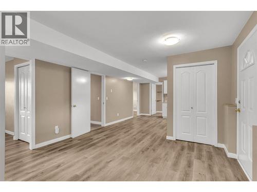 Lower level connects to upstairs through the doorway - 885 Walrod Street, Kelowna, BC - Indoor Photo Showing Other Room