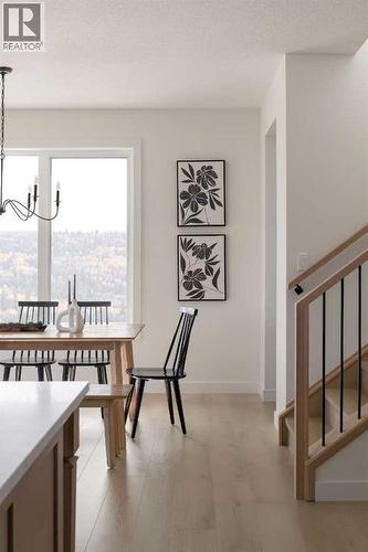 28 Sunvalley View, Cochrane, AB - Indoor Photo Showing Dining Room