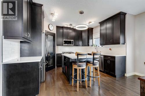 RecentlyUpgraded Countertop & Backsplash - 382 Williamstown Green Nw, Airdrie, AB - Indoor Photo Showing Kitchen With Upgraded Kitchen