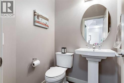 Main Half Bathroom - 382 Williamstown Green Nw, Airdrie, AB - Indoor Photo Showing Bathroom