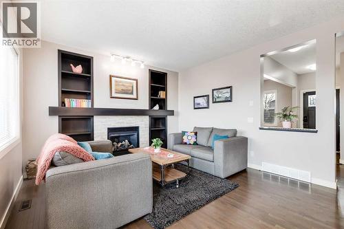 382 Williamstown Green Nw, Airdrie, AB - Indoor Photo Showing Living Room With Fireplace