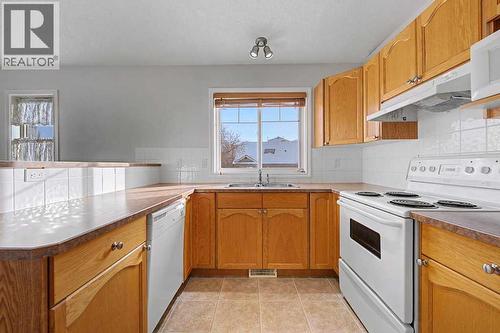 272 Chaparral Drive Se, Calgary, AB - Indoor Photo Showing Kitchen With Double Sink