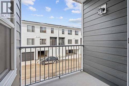 1506, 25 Wildwoods Court Sw, Airdrie, AB - Outdoor With Balcony With Exterior