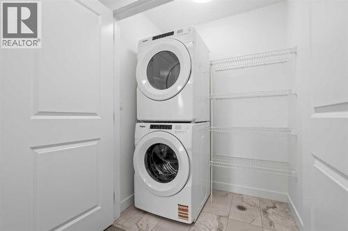 1506, 25 Wildwoods Court Sw, Airdrie, AB - Indoor Photo Showing Laundry Room