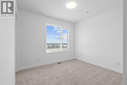 1506, 25 Wildwoods Court Sw, Airdrie, AB - Indoor Photo Showing Other Room