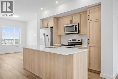 1506, 25 Wildwoods Court Sw, Airdrie, AB - Indoor Photo Showing Kitchen