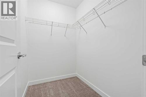 1506, 25 Wildwoods Court Sw, Airdrie, AB - Indoor With Storage