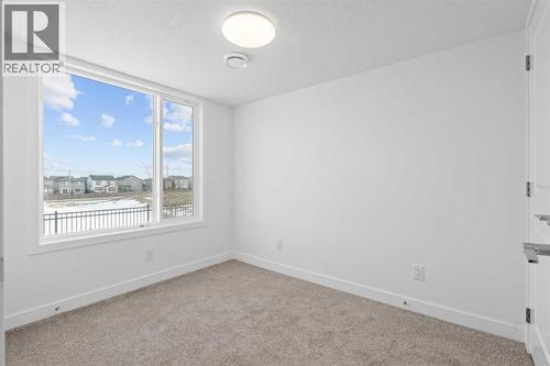 1506, 25 Wildwoods Court Sw, Airdrie, AB - Indoor Photo Showing Other Room