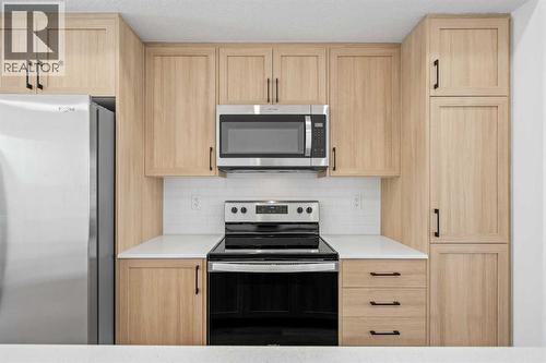 1506, 25 Wildwoods Court Sw, Airdrie, AB - Indoor Photo Showing Kitchen