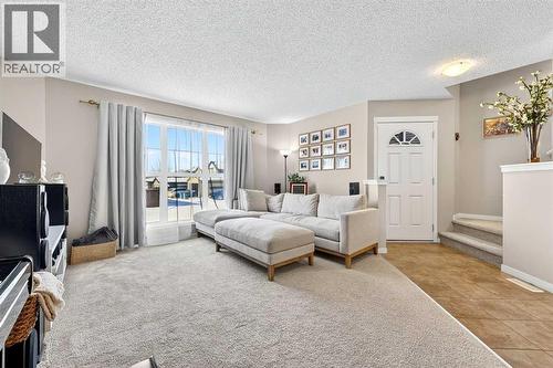 336 Cranberry Circle Se, Calgary, AB - Indoor Photo Showing Living Room