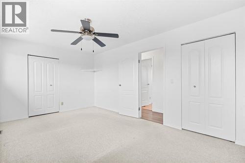 Primary Bedroom - 724 Pinecliff Road Ne, Calgary, AB - Indoor Photo Showing Other Room