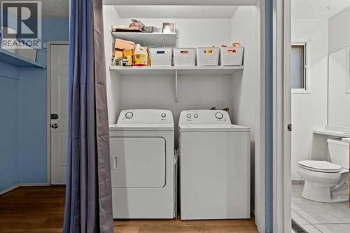Main Floor Laundry - 6 Castleglen Road Ne, Calgary, AB - Indoor Photo Showing Laundry Room