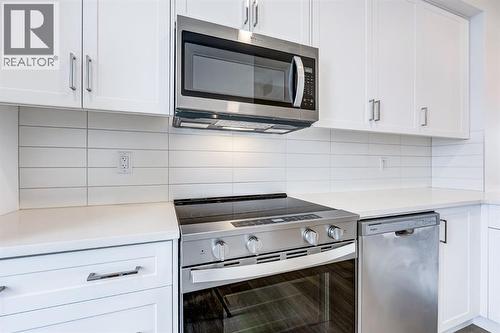 202, 437 Alpine Avenue Sw, Calgary, AB - Indoor Photo Showing Kitchen