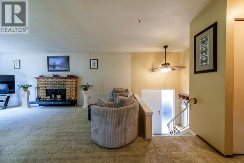 1835 Westsyde Road, Kamloops, BC - Indoor Photo Showing Living Room With Fireplace