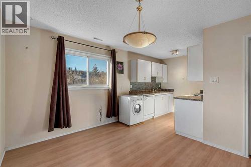 14, 8112 36 Avenue Nw, Calgary, AB - Indoor Photo Showing Laundry Room