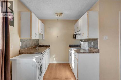 14, 8112 36 Avenue Nw, Calgary, AB - Indoor Photo Showing Laundry Room