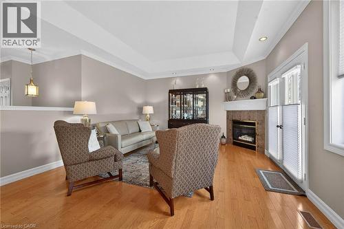 57 Bluelagoon Drive, Mount Hope, ON - Indoor Photo Showing Living Room With Fireplace