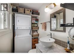 Super convenient apartment size laundry set located in fully renovated ensuite bathroom - 