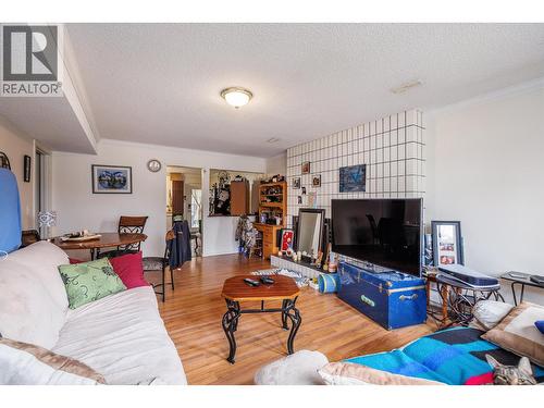 View from living room on the main/first level looking towards the kitchen - 865 Theodora Road, Kelowna, BC - Indoor Photo Showing Living Room