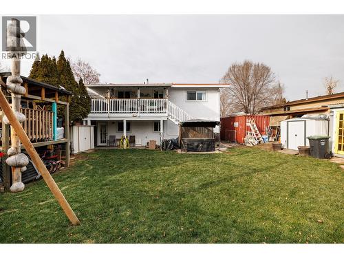 Well-maintained backyard of home - 865 Theodora Road, Kelowna, BC - Outdoor With Deck Patio Veranda