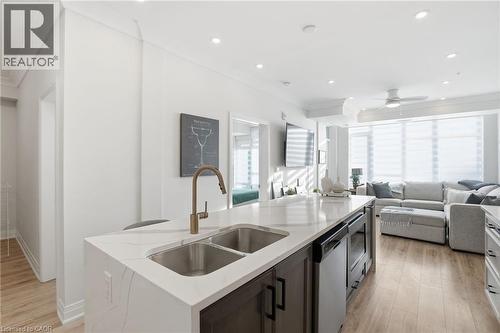 16 Concord Place Unit# 346, Grimsby, ON - Indoor Photo Showing Kitchen With Double Sink With Upgraded Kitchen