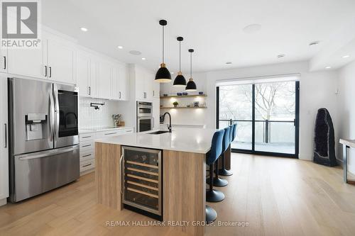 Main Level - Kitchen / door to terrace - 2167 Rice Avenue, Ottawa, ON - Indoor Photo Showing Kitchen With Upgraded Kitchen