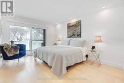 2nd floor - Primary bedroom / door to balcony - 