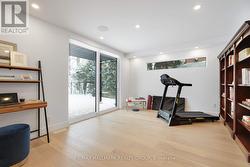 Lower level - Media room / door to patio - 