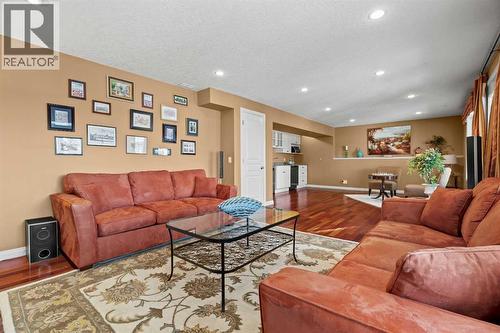 63 Springbank Crescent Sw, Calgary, AB - Indoor Photo Showing Living Room