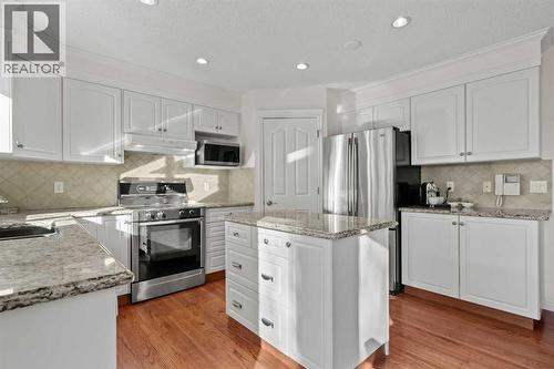 63 Springbank Crescent Sw, Calgary, AB - Indoor Photo Showing Kitchen With Upgraded Kitchen